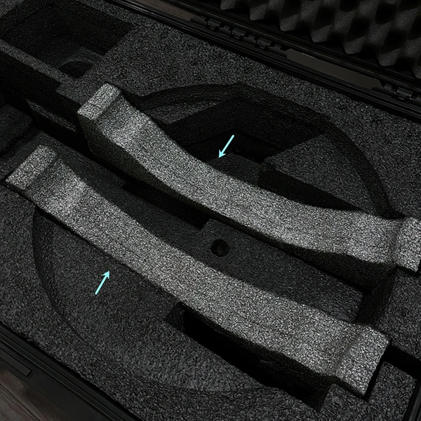 Photo of the HALO travel case with the top foam inserts being lifted out