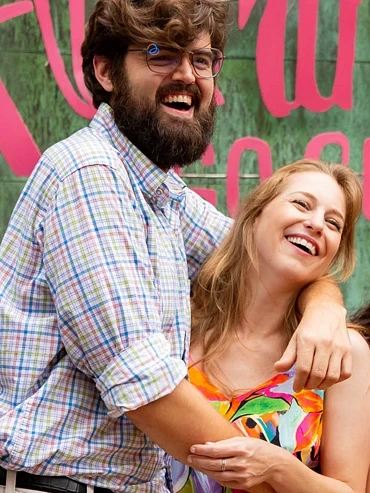 Couple posing with a photo booth