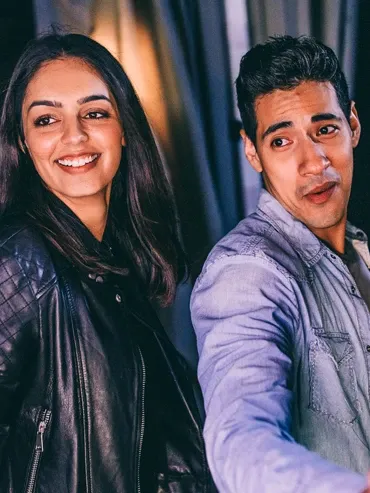 Travelers posing for a photo booth
